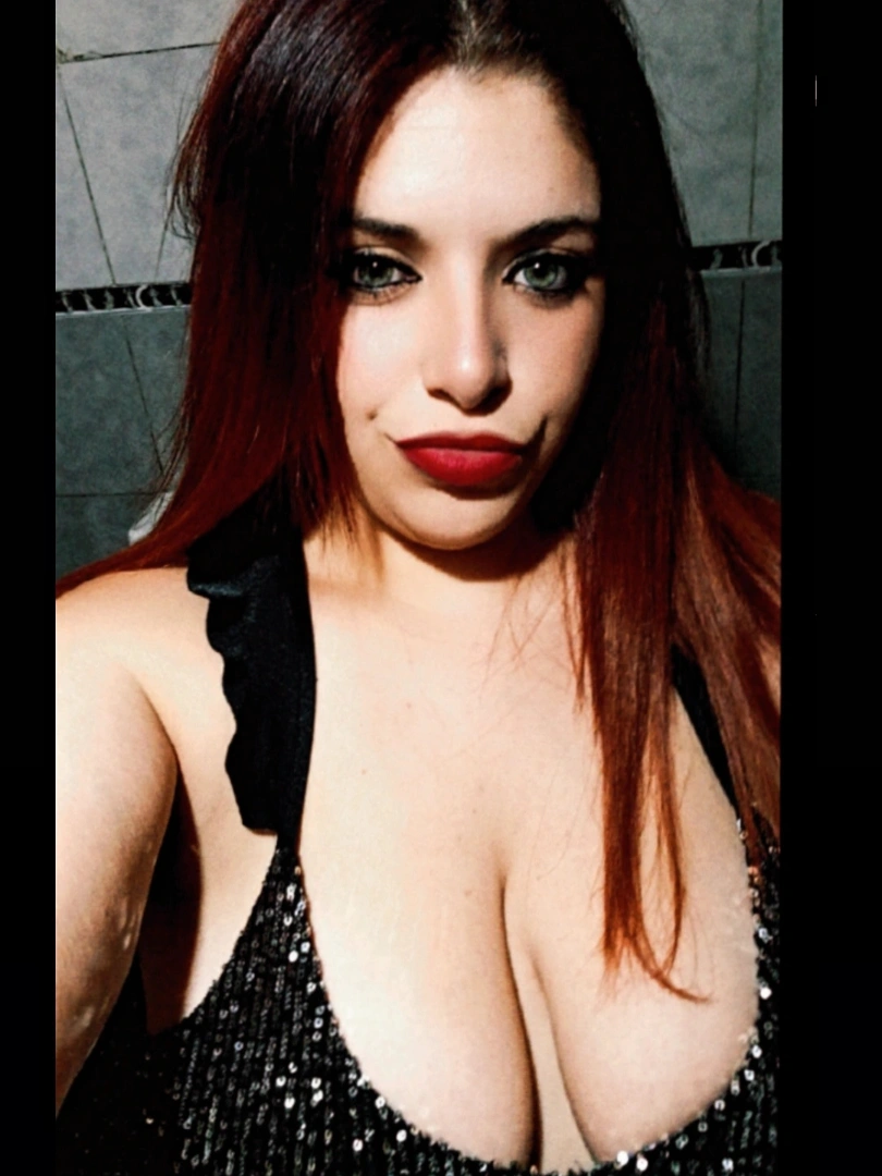 Micaela, an adult member from Argentina, looking towards the camera