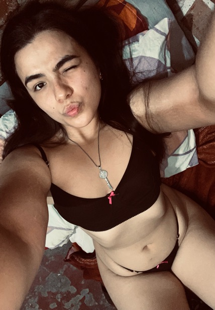 Naty, an adult member from Argentina, facing the camera