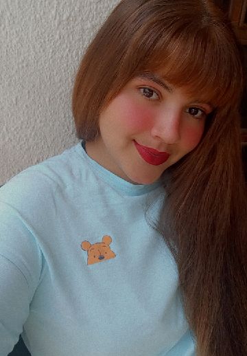 Maria, an adult member from Brazil, in a close portrait