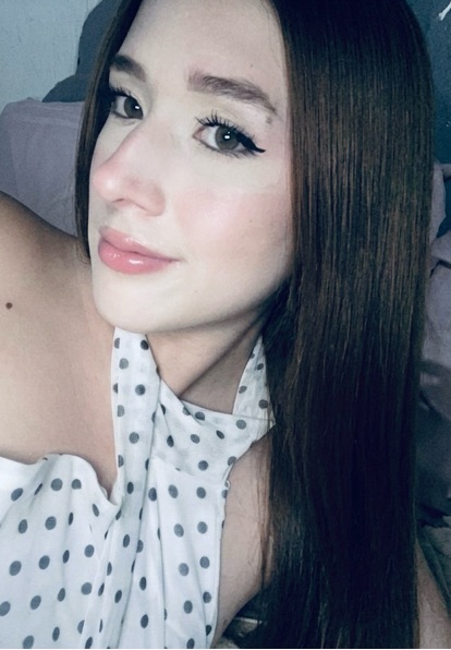 Jennis, an adult member from Mexico, looking towards the camera