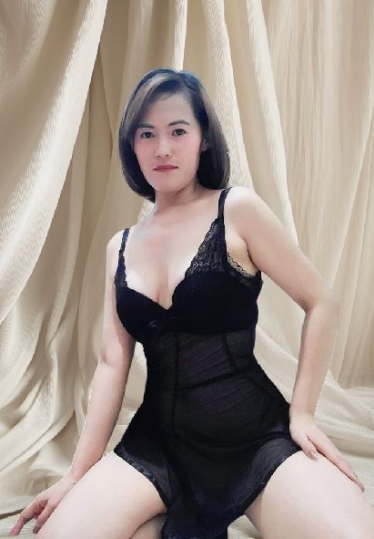 Asianna, an adult member from the Philippines, with a warm smile